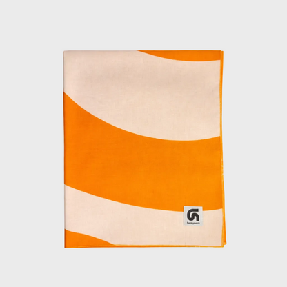 Fular Solana naranja, beige, melocotón y fucsia doblado de la colección Mediterraneum de FunkyNeck